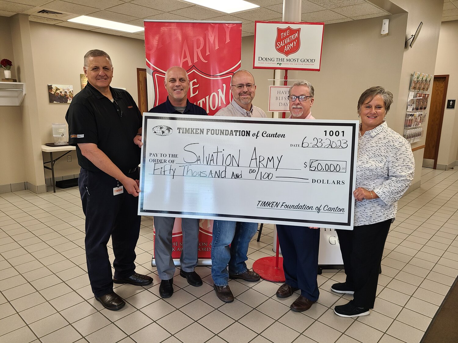 A check is presented to The Salvation Army.